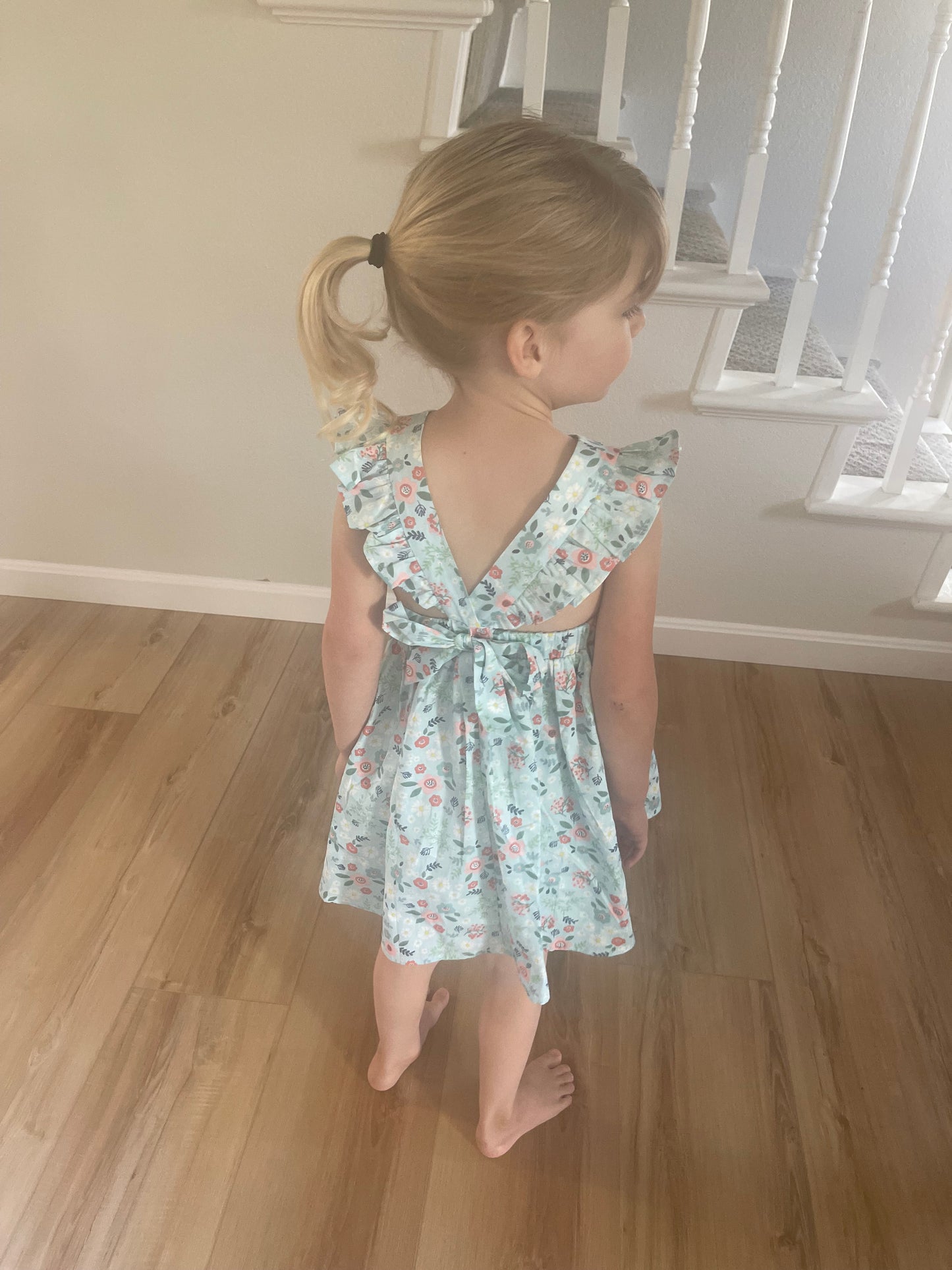 L.W. Clothing Company Blue Floral Girls Dress with Ruffle Sleeves and Open Tie Back